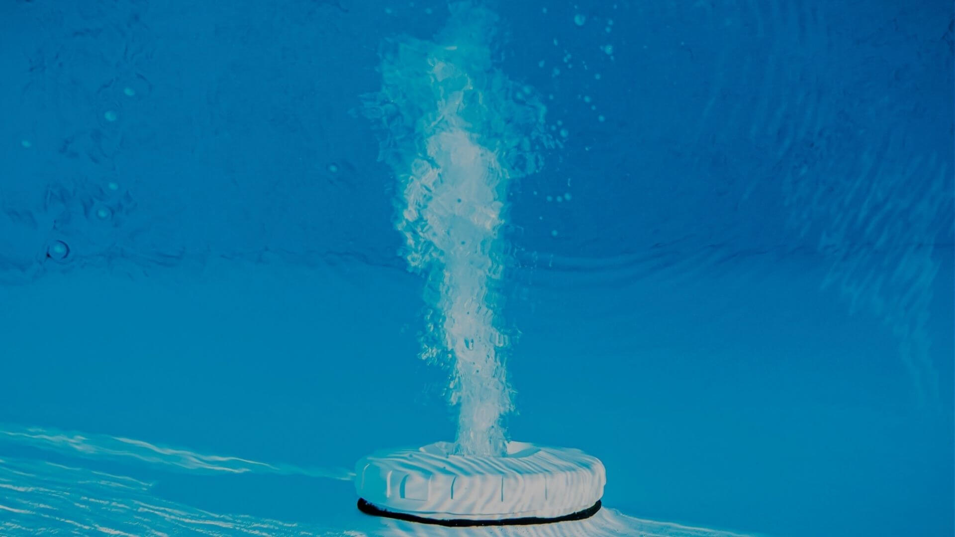 Underwater pool chlorine tablet dissolving in residential swimming pool in Brentwood CA